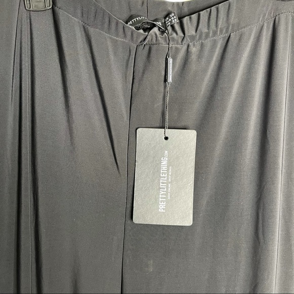 Pretty Little Thing Black Slinky Flared Leg Pants - Picture 3 of 5